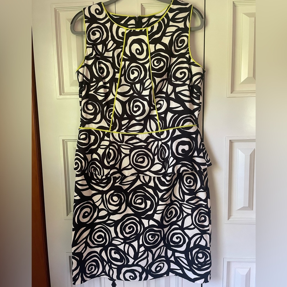 Women’s black and white peplum dress with lime detail, size 14, like new
